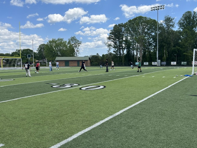 Students playing soccer
