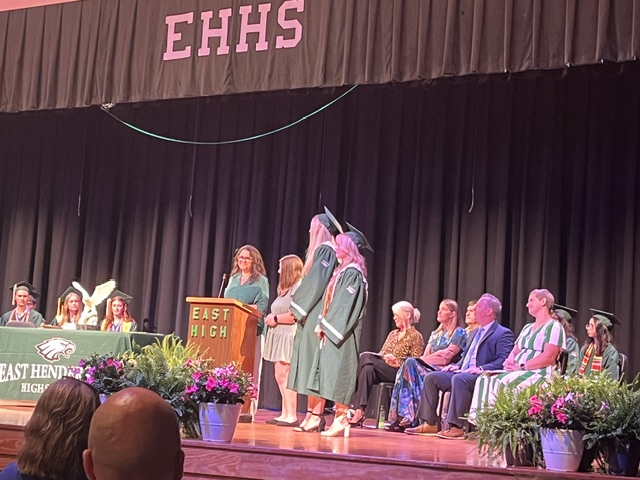 Sarah and Julia receiving awards