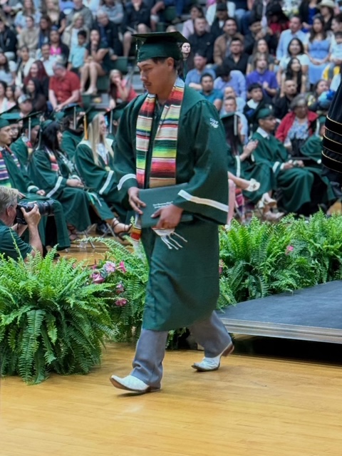 Enrique walking off the stage