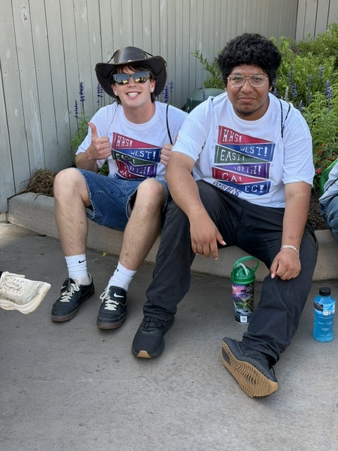 Wyatt and Eddie waiting on curb