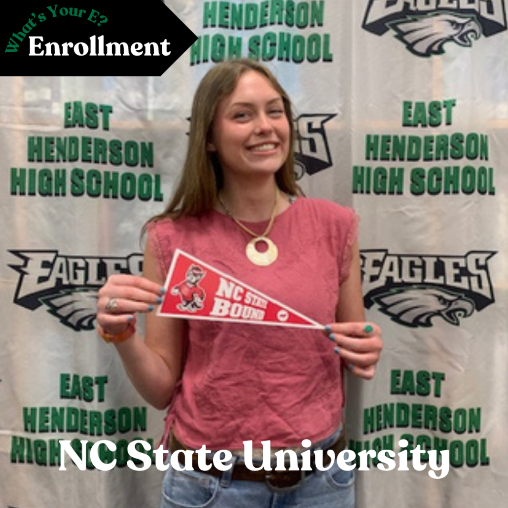 Elizabeth holding mini pennant in enrollment photo