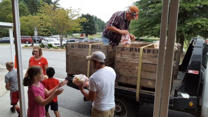 Students getting an apple delivery