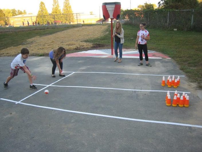 Students bowling outside