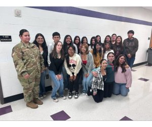image of students standing in a hallway 