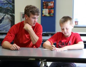 North student mentors younger student