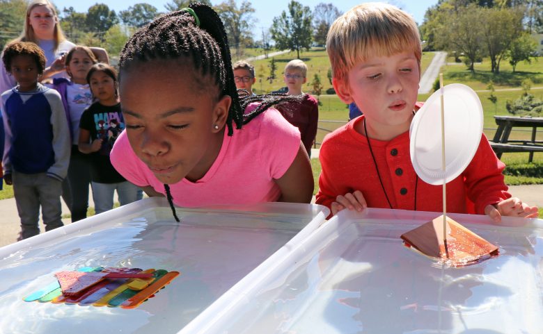 Students race handmade boats