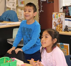 1st-graders gasp as Santa enters the room