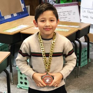 Student wearing a Positive Behavior chain at Bruce Drysdale