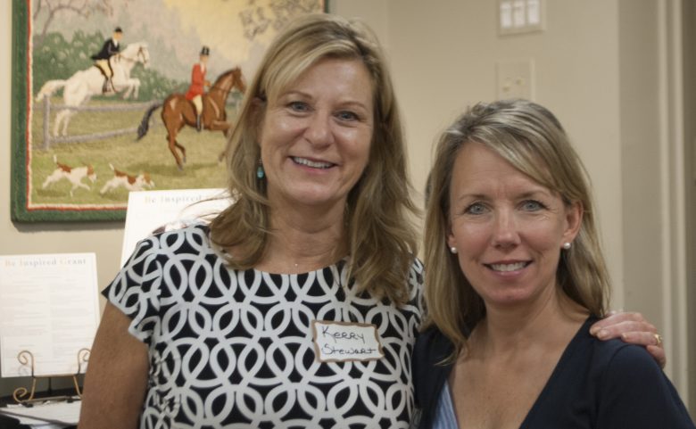 Hendersonville Elementary principal Kerry Stewart (left) poses with BIG winner Cara Brock (right).