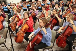 Cellists practice for the Berrian All-County Orchestra Festival