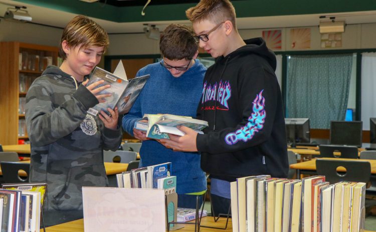 Students read library books