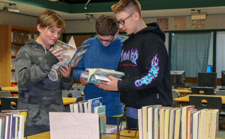 Students read library books