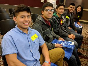 5 students sitting in a row