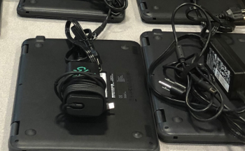 computers on table with "learn from home" text