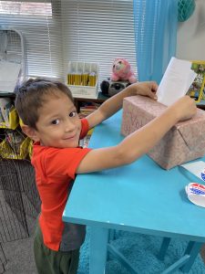 Etowah student putting ballot in the box