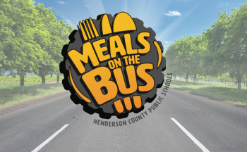 A logo that says "Meals on the Bus Henderson County Public Schools." The background image is a road with sky and trees.