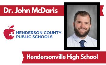 Portrait of Dr. John McDaris, shown smiling in a yearbook photo. The graphic includes the Henderson County Public Schools logo and text reading "Dr. John McDaris" and "Hendersonville High School."